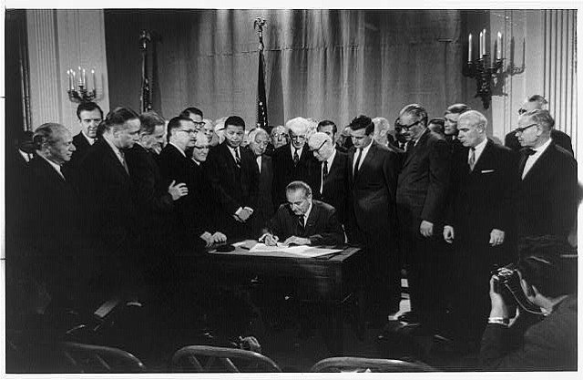 President Lyndon Baines Johnson signs Civil Rights Bill, also known as the Fair Housing Act, April 11, 1968.